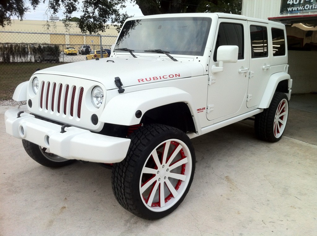 Custom painted matte white Jeep Wrangler four door on Custom painted