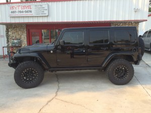 Jeep Wrangler 4 door with Mmats Pro Audio installed.