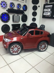 Next Level mini car completely custom painted with Kicker Audio.
