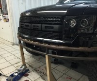 Custom Rhino lined trim and custom bumper on F-150 Raptor