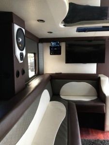Brown and white Ostrich interior with Mclaren audio, Fiber optic mirrored roof, multicolor LED's, strobes, and two Samsung LED Smart TV's
