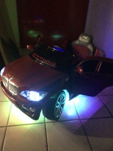 Mini car with Wetsounds Marine RGB LED strips and wireless controller.