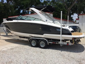 Regal 2800 Bowrider with Wetsounds Rev 8 tower speakers installed.