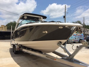 Regal 2800 Bowrider with Wetsounds Rev 8 tower speakers installed.