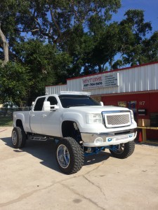 Completely custom 2008 GMC Sierra 2500 with Custom Molded Headlights and Bumper.