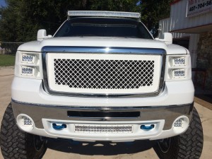 54" curved, 20" curved, 2 Dually XL's and 4 4" E series light bars installed on a 2008 GMC 2500.