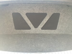 Custom enclosure hidden by trim panel