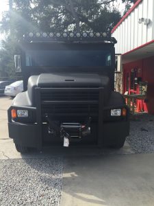 Custom removable winch on custom armored truck limo