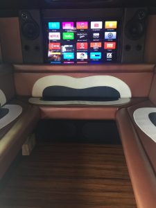 custom armored truck TV and custom seats in armored truck limo