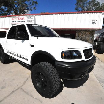truck customization install lifted tires